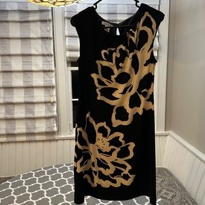 Cute women’s black and cream floral dress.